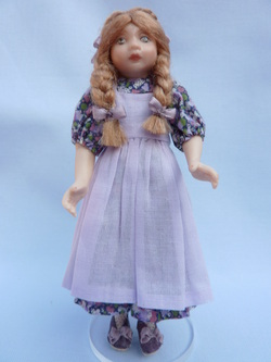 Miniature child doll